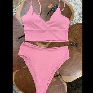 Pink high rise two piece swimsuit.
